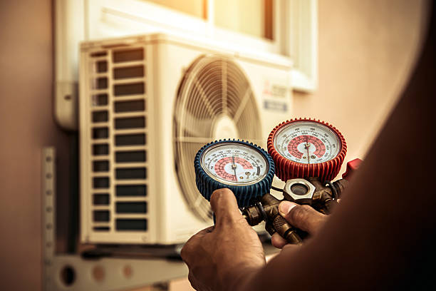 Professional Air Conditioning Service technician working in Tallevast, FL